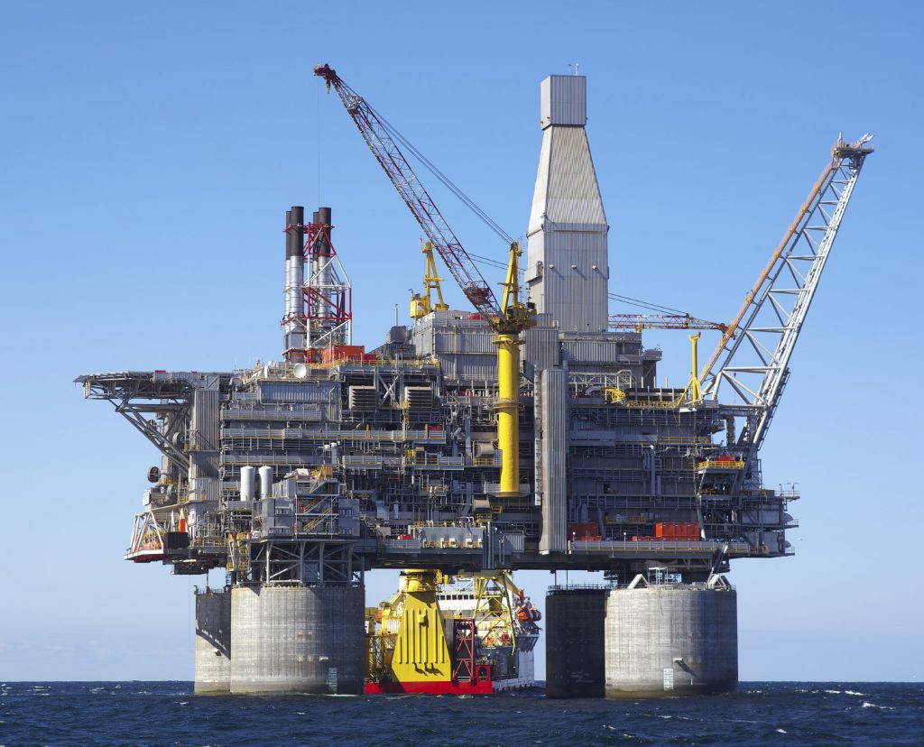 an oceanic oil rig viewed from afar